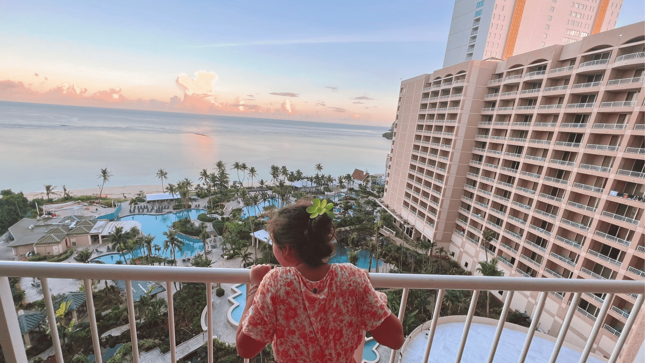 Girl looking at View from the Hyatt Regency Guam - Reward Night Room