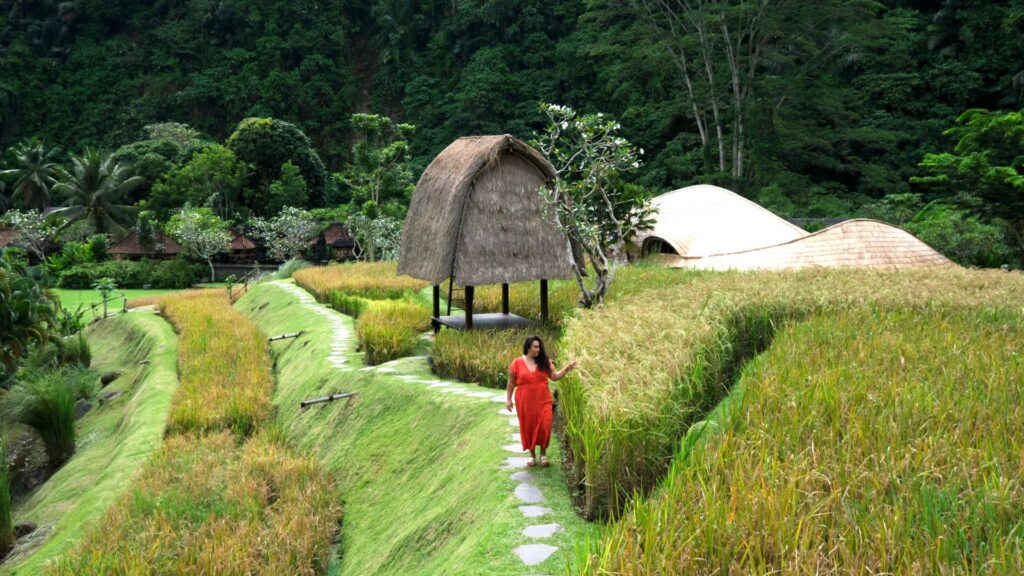 Amanda in an orange dress on the rice terraces at Mandapa, a Ritz-Carlton Reserve in Ubud, Bali, before tirzepatide
