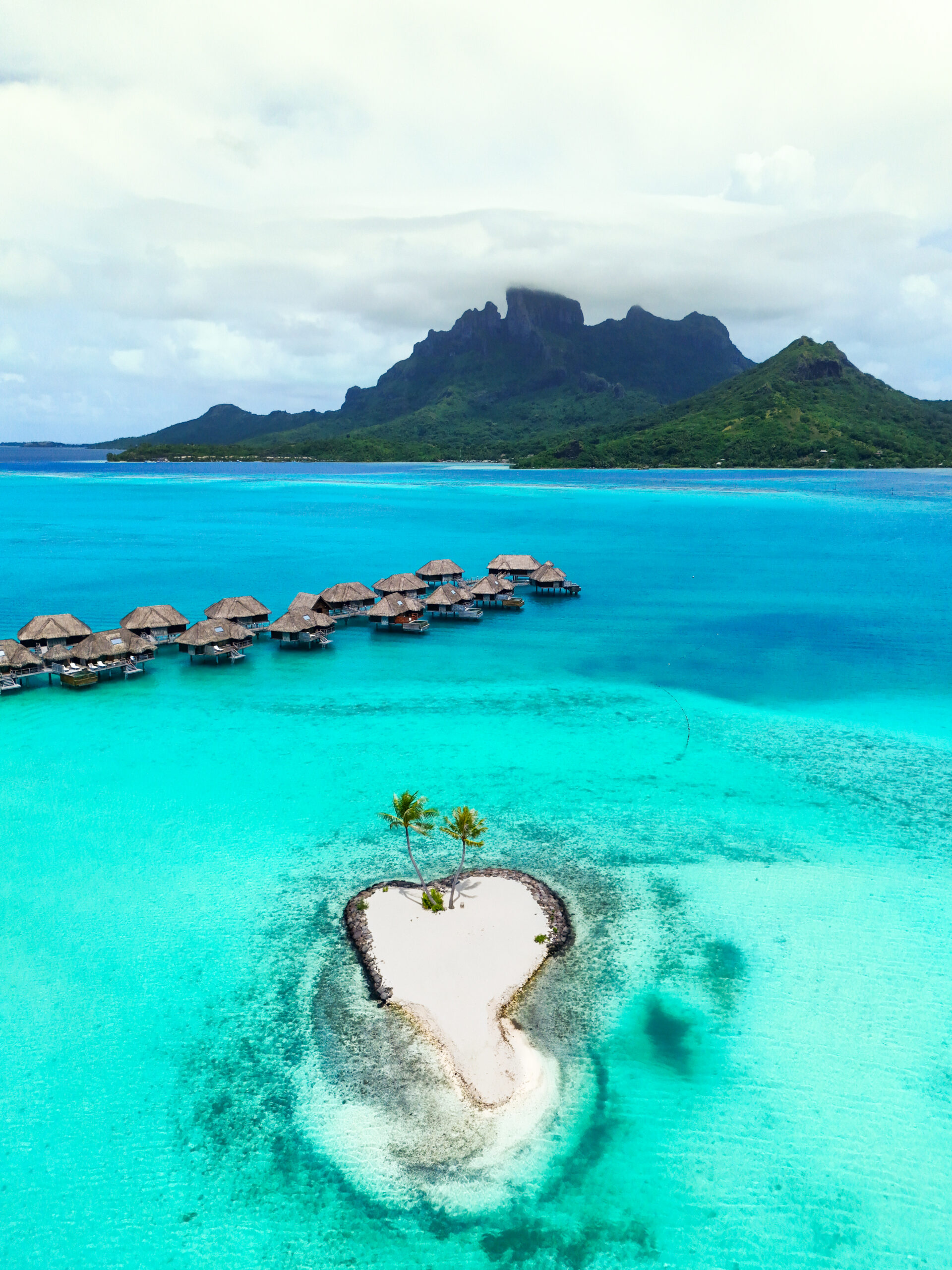 Four Seasons Bora Bora Resort Heart Island Overlooking the Overwater Bungalows and Mount Otemanu - Luxury Family Travel with Salty Vagabonds Family