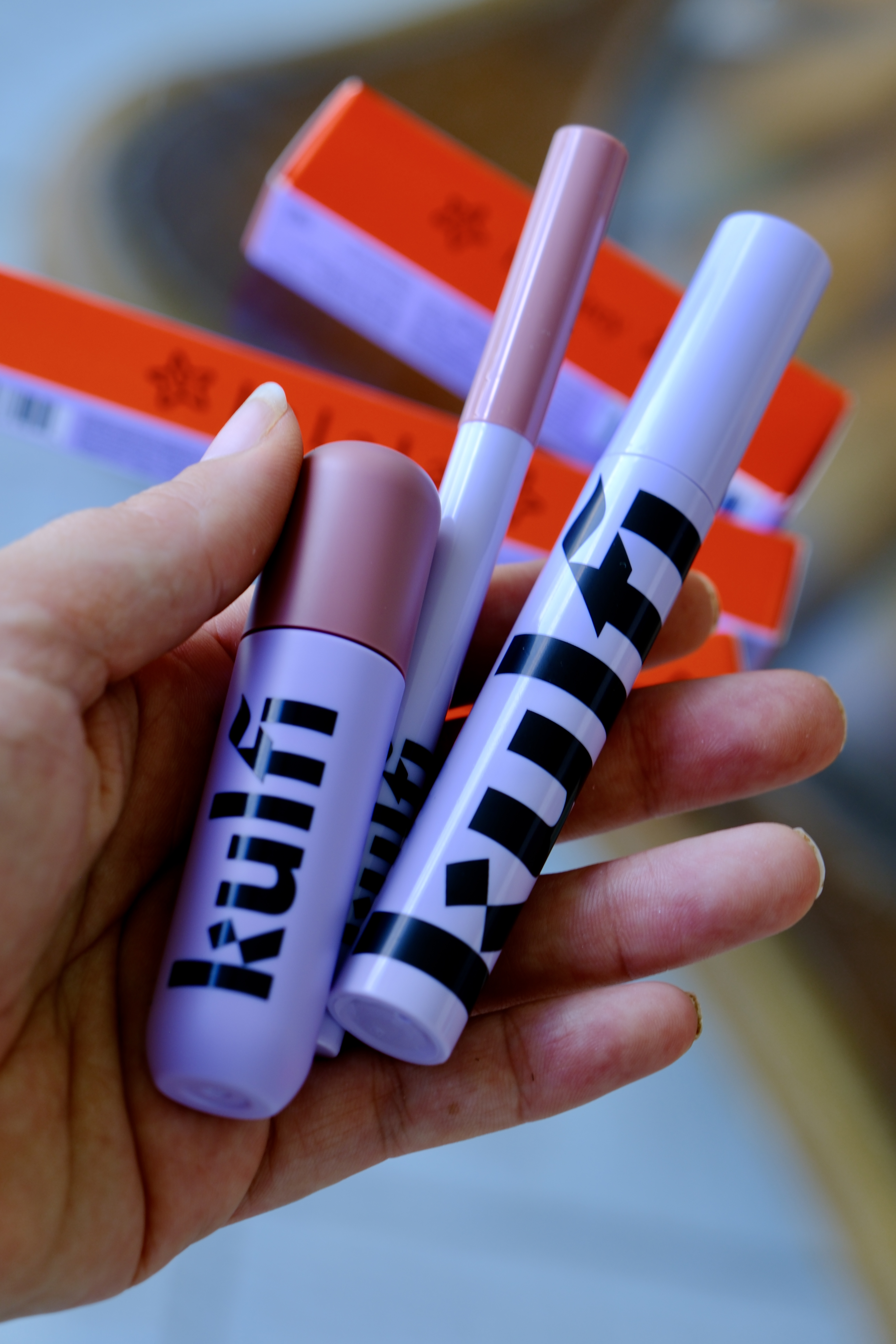 what Kulfi Lassi Lips Matte Blur Lip Stain in Earl Grey, Lassi Lips Staining Lip Liner in La La La and Badi Lash Mascara look like in hand, gifted to Mexican American beauty influencer Amanda Dishman of Salty Vagabonds