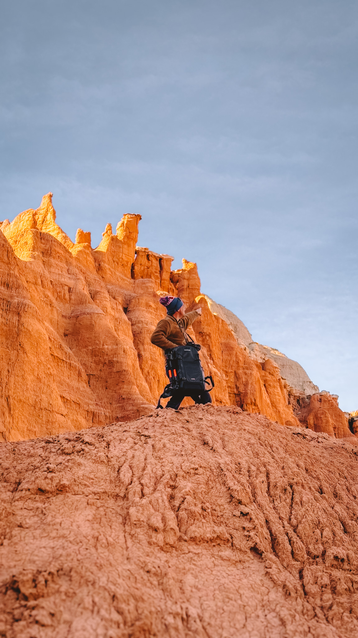 Nanuk N-PVD 35L camera backpack review: Alex on a red rock desert hike, Salty Vagabonds